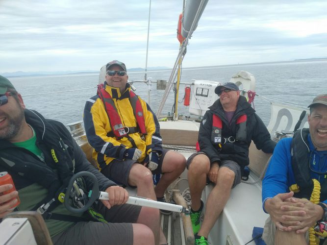 Boys in the boat.  Having fun!